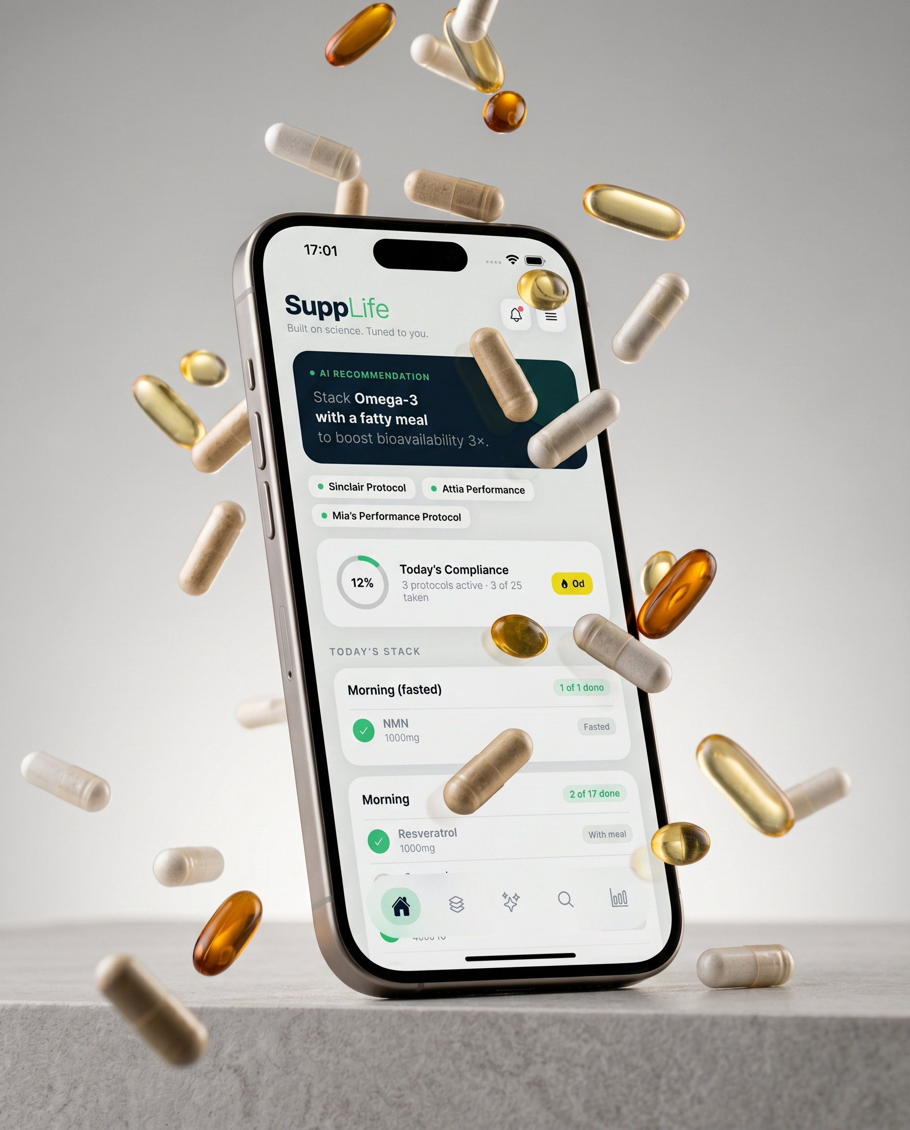 SuppLife app on iPhone surrounded by supplement capsules